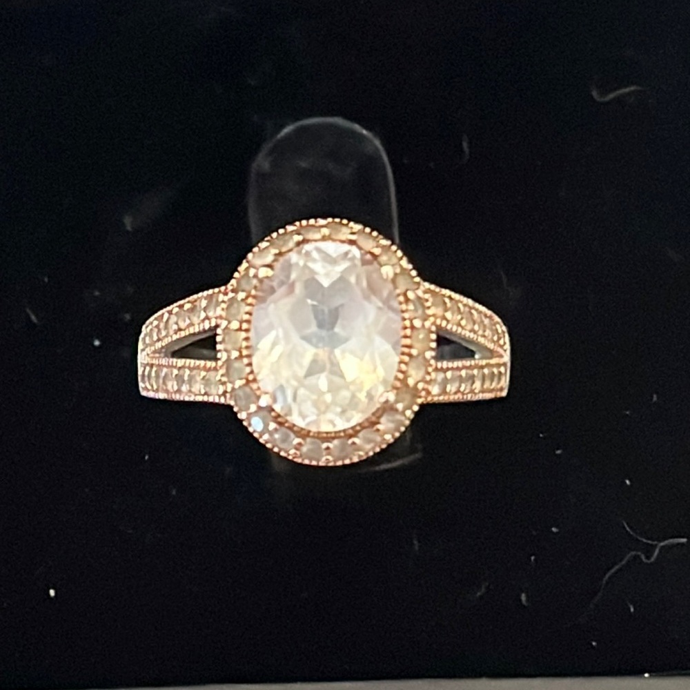 18k over 925 silver white topaz ring.